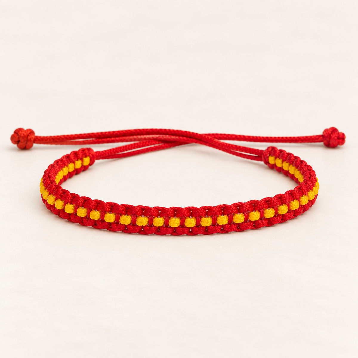 Ruby Red & Golden Yellow Woven Soft Thread Bracelet Main image