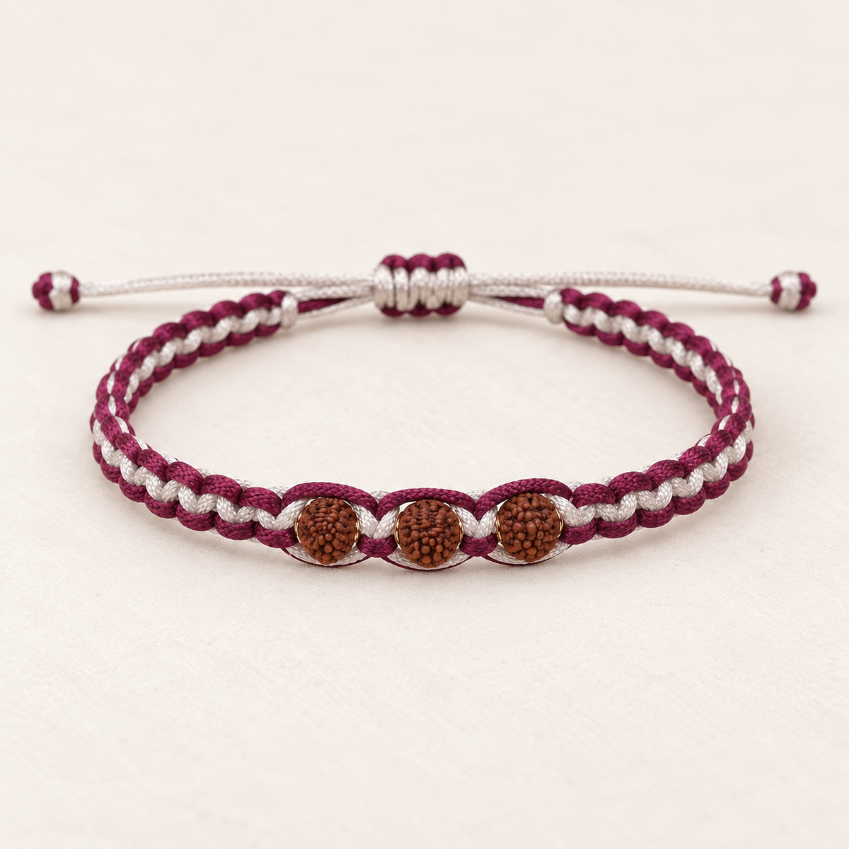 Sacred Maroon & White Braided Rudraksha Band With Silver Cap Main image