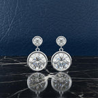 Radiance Bezel Drop Diamond Earrings