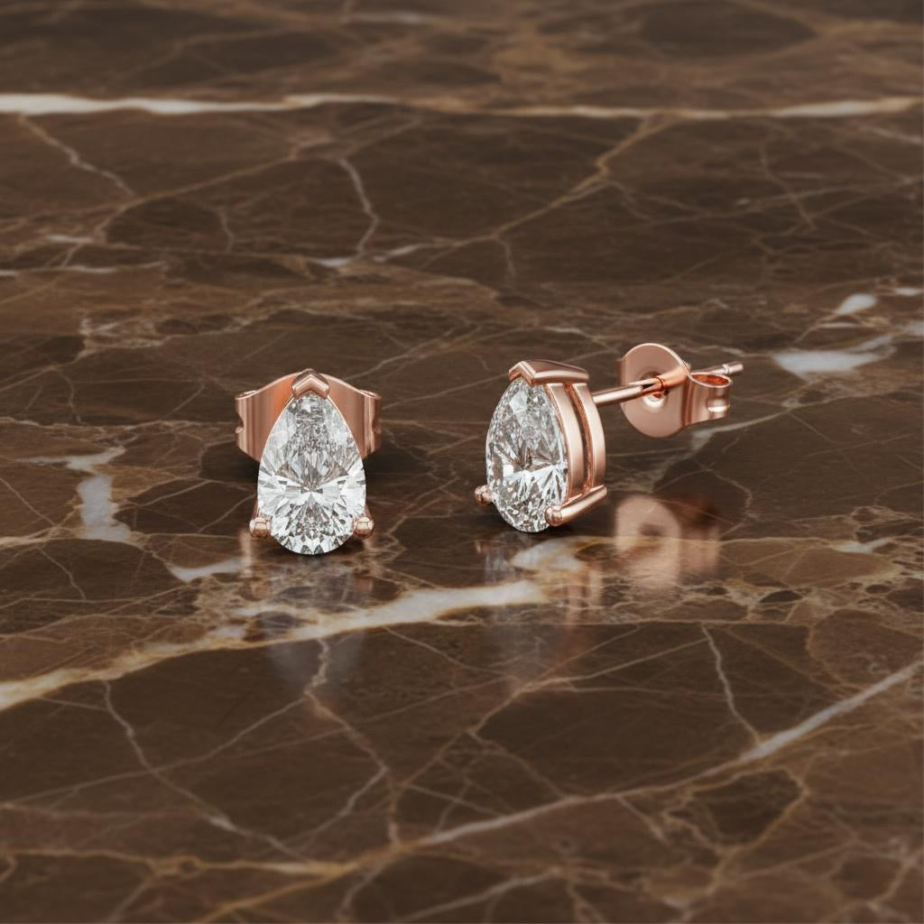 Pear Solitaire Stud Earrings