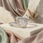 solitaire pear halo ring