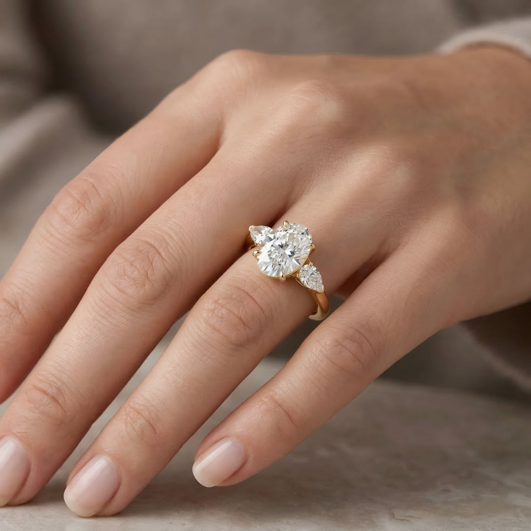 Solitaire Oval Trilogy Ring Secondary image