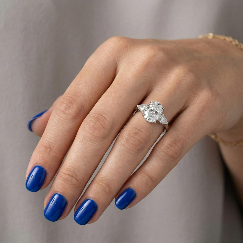 Solitaire Oval Trilogy Ring Secondary image