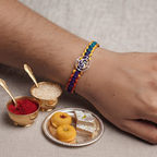 Designer Multi-Color Thread Silver Rakhi with Swastika Motif