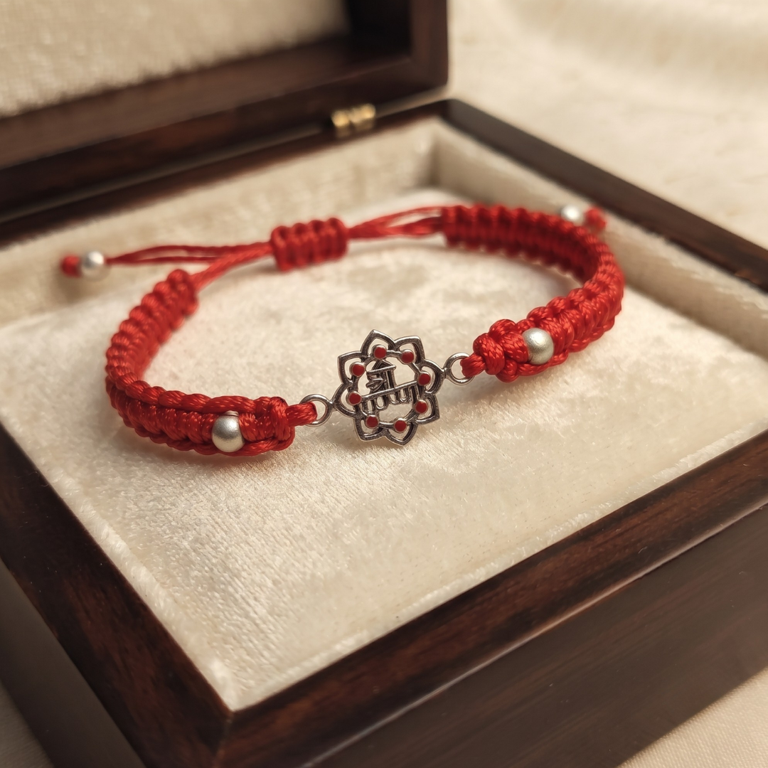 Traditional Elegance Silver Balls & Shree Krishna Red Band/Rakhi