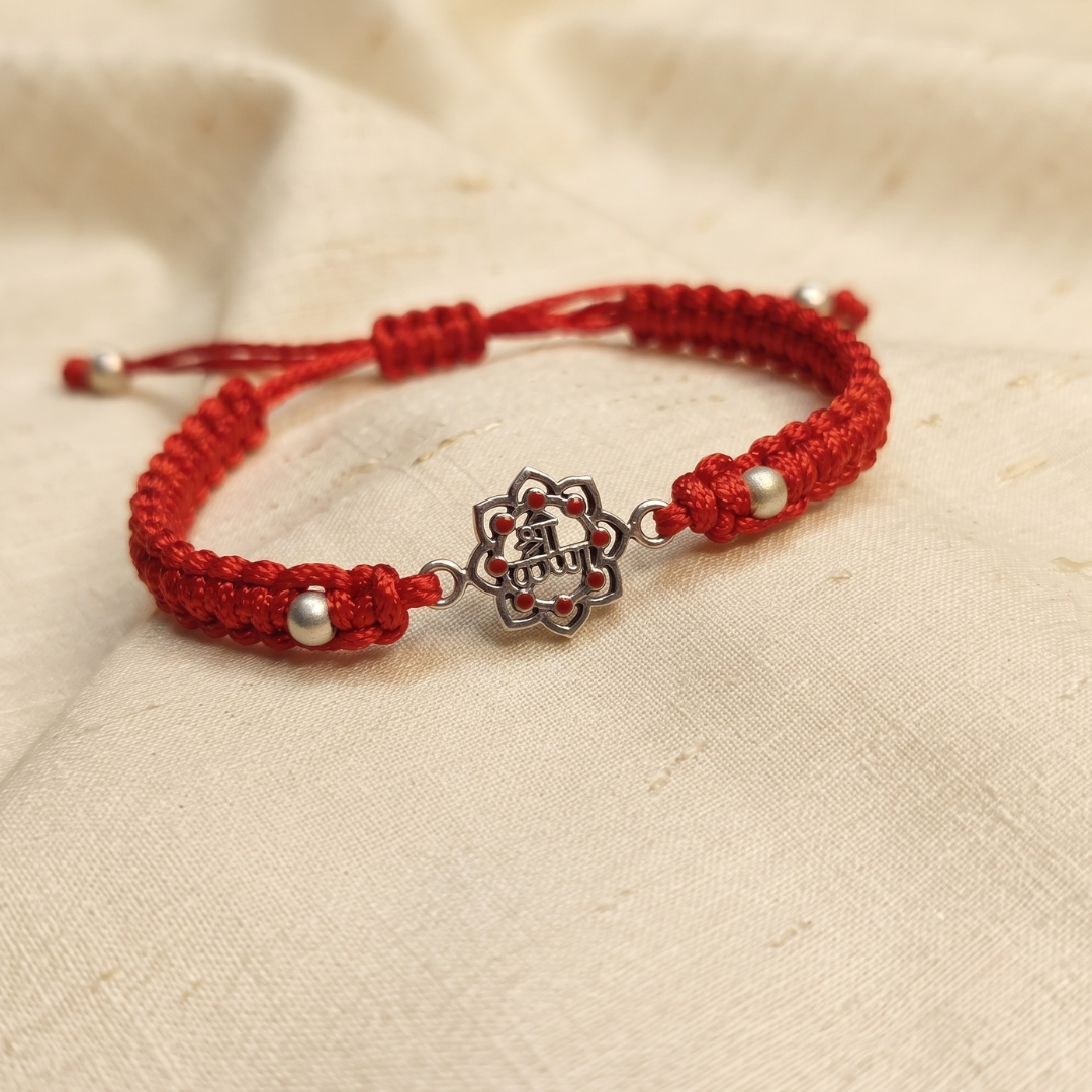 Traditional Elegance Silver Balls & Shree Krishna Red Band/Rakhi