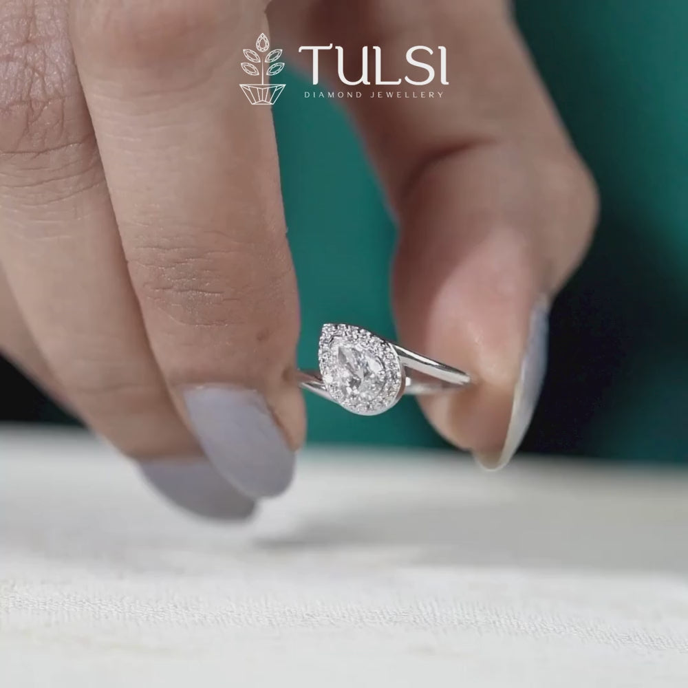 solitaire pear halo ring